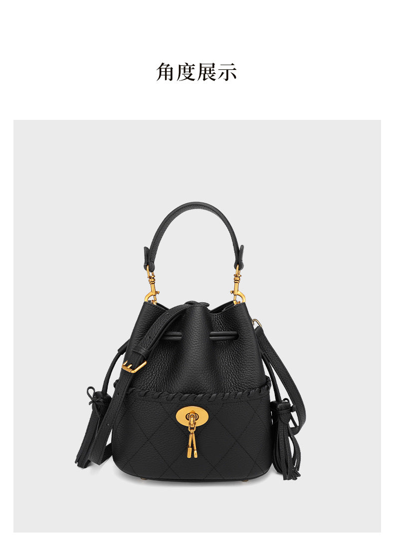European and American First Layer Cowhide Women's New Genuine Leather Handbag Trendy Bucket Bag Tassel Niche Drawstring Shoulder Crossbody Bag