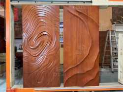 Natural Ash Solid Wood clear Lacquer 3D Irregular Surface Design Modern Front Entry Pivot Door with Long Handle and Smart Lock