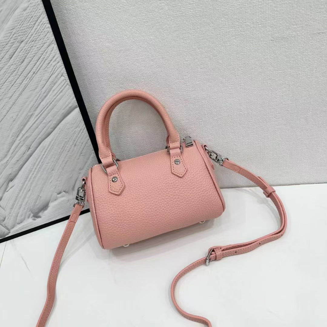 Guangzhou High-Quality Texture Genuine Leather Boston Pillow Bag for Women2024New first-layer cowhide handbag and crossbody bag