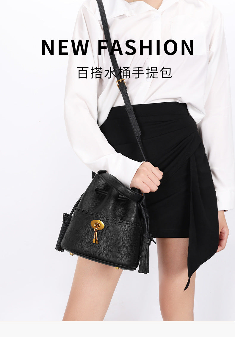 European and American First Layer Cowhide Women's New Genuine Leather Handbag Trendy Bucket Bag Tassel Niche Drawstring Shoulder Crossbody Bag