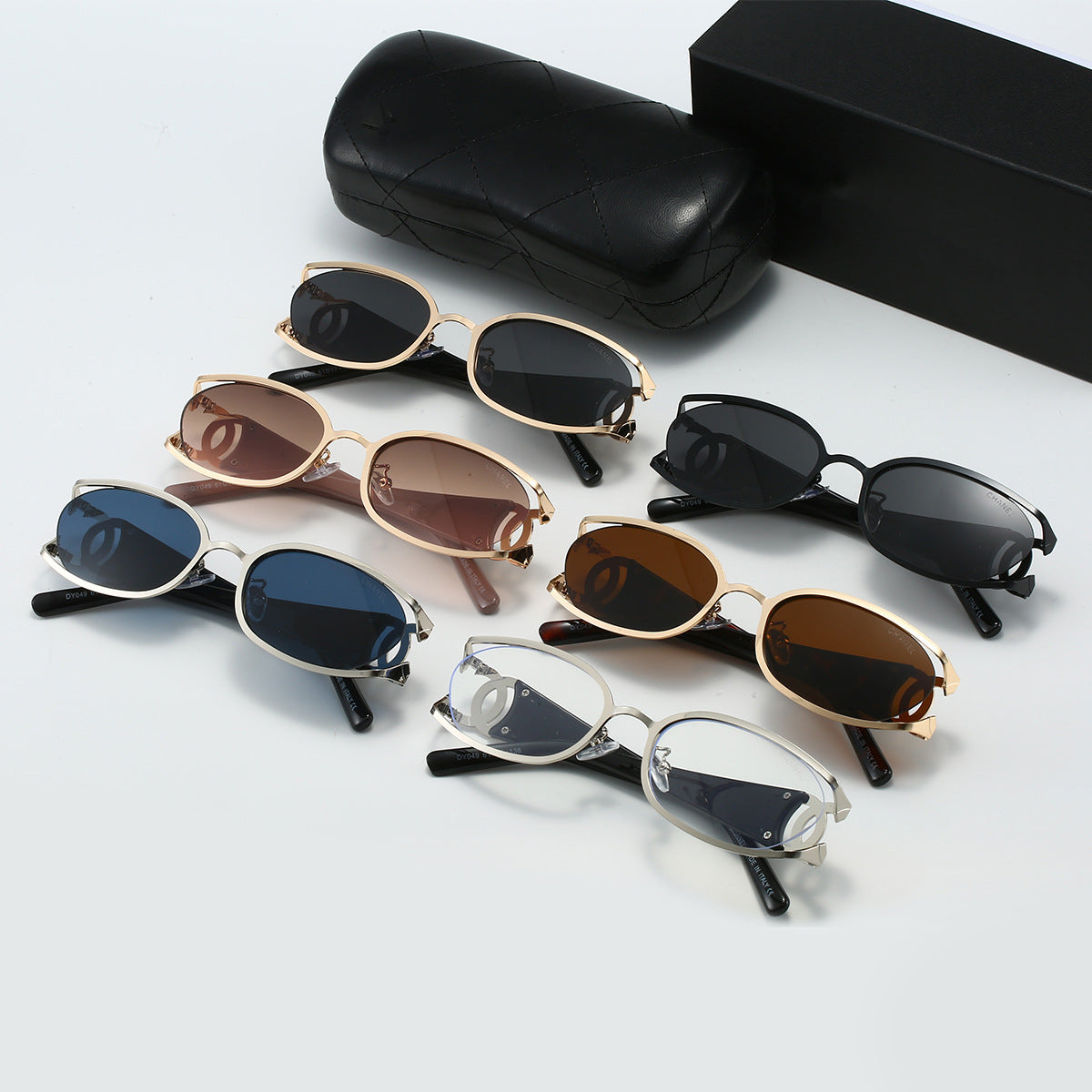 Chanel Style Double C Letter Sunglasses Metal Frame gold Hollow Temple Sunglasses for Women Oval Vintage Style Fashionable