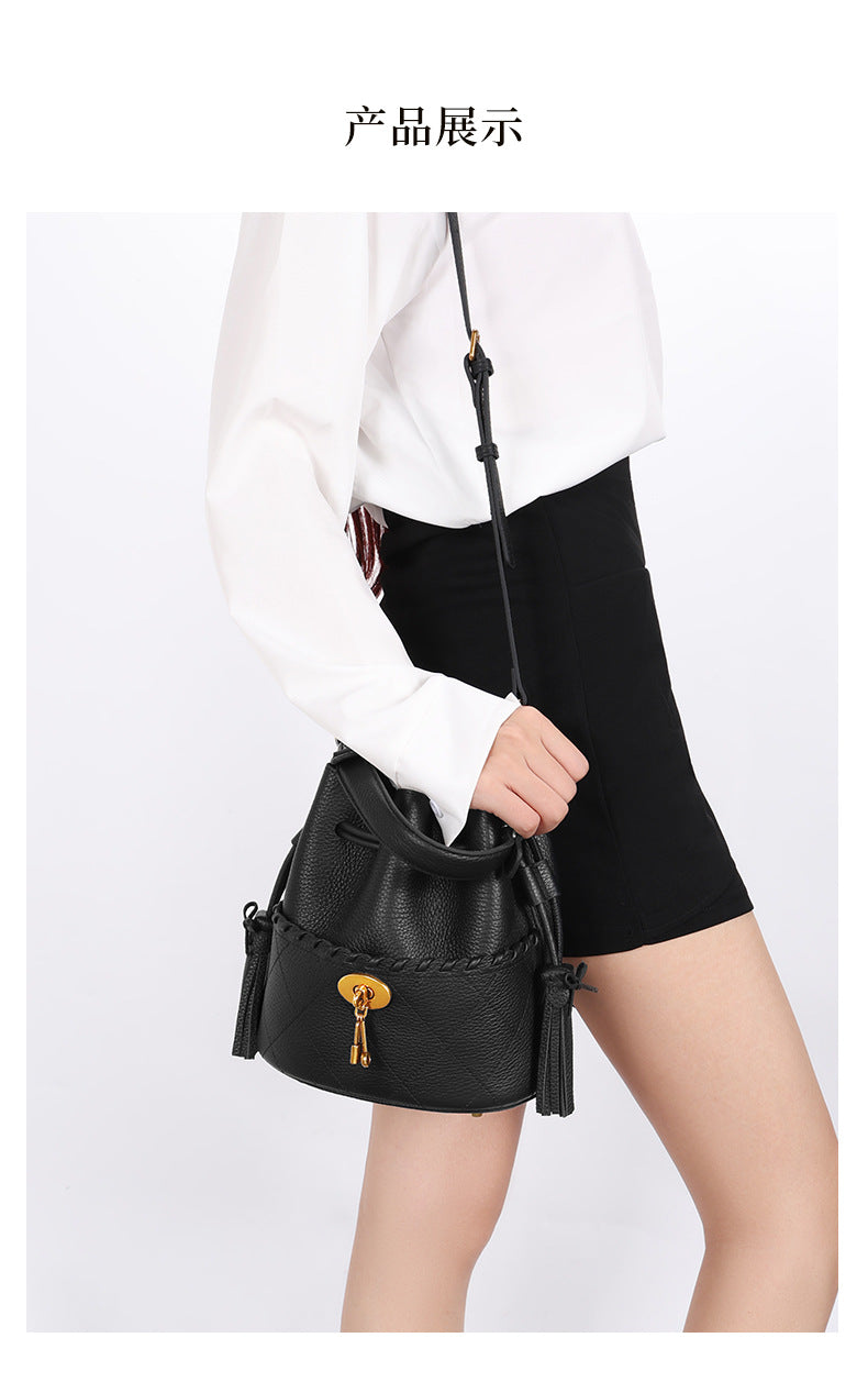 European and American First Layer Cowhide Women's New Genuine Leather Handbag Trendy Bucket Bag Tassel Niche Drawstring Shoulder Crossbody Bag