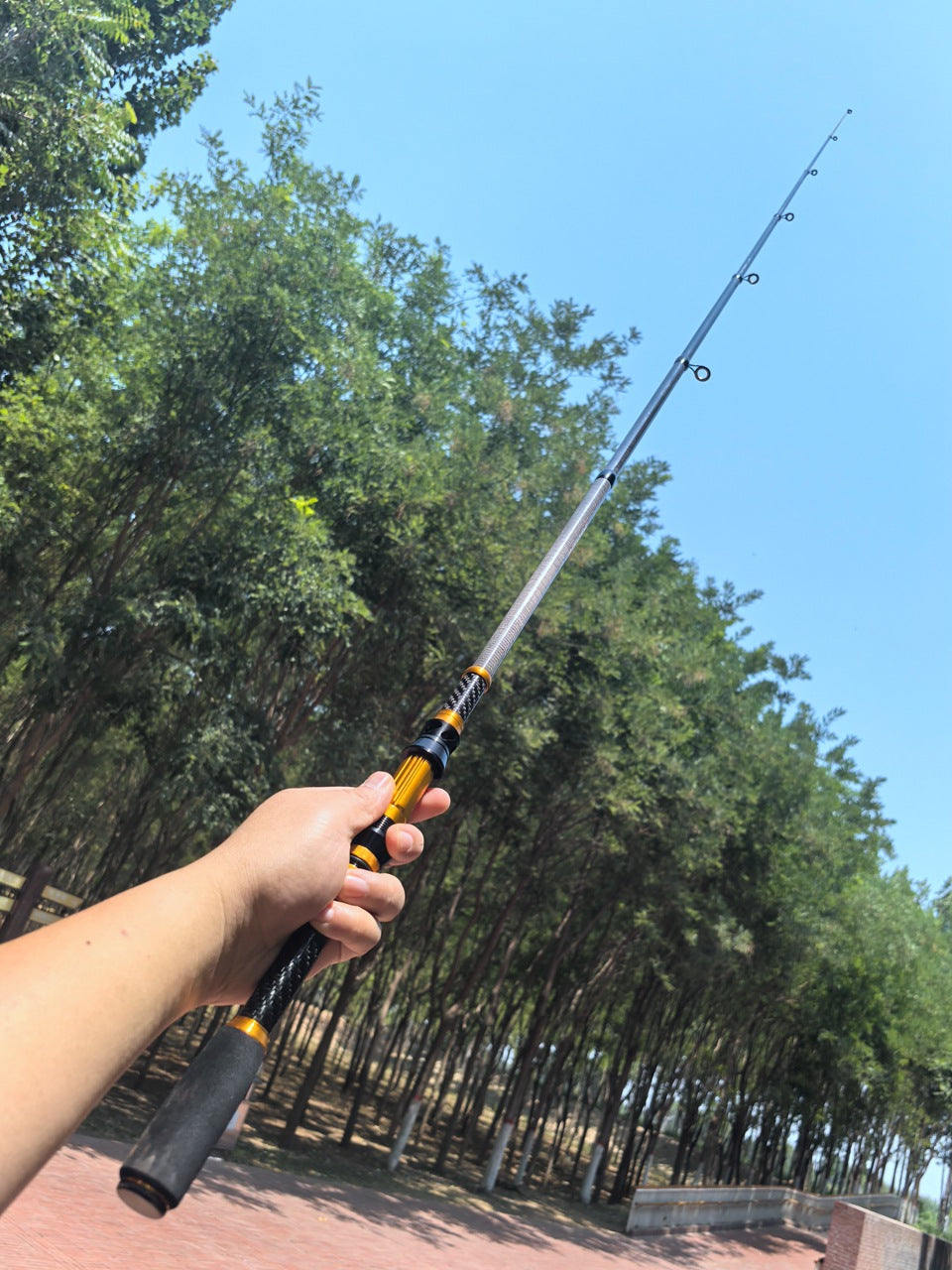 Manufacturer Wholesale New Short Section Sea Rod Carbon Fiber Telescopic Universal Fishing Rod Portable Lure Rod European and American Fishing Gear